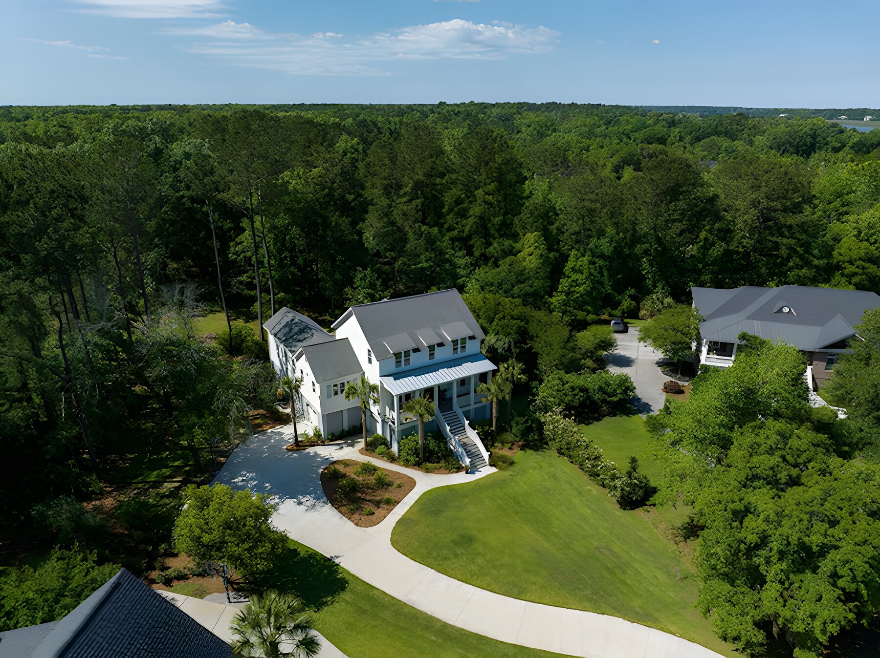 Aerial view of a Lowcountry custom home set in the trees