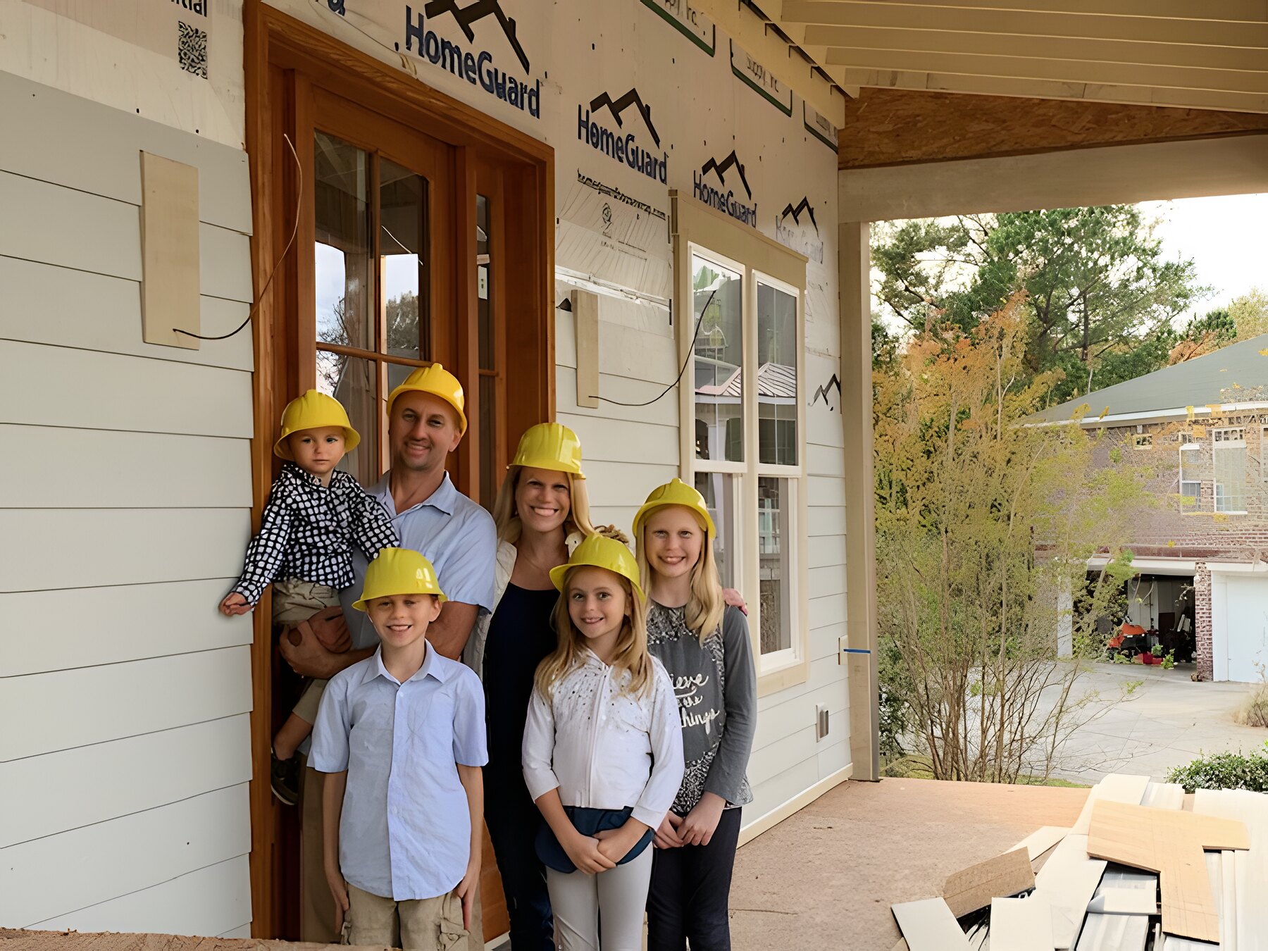Jason with his family on a Seascape Homes job site